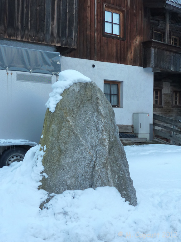 To the southern side of the town of Mayrhofen, in the locality of Stoanerhof, a couple of large stones can be seen standing at the sides of various lanes between the farms and chalets. I only have pics of this one. 

I have no idea whether they are ancient menhirs, but they don't look natural to me, and look to have been stood in their positions deliberately. 
