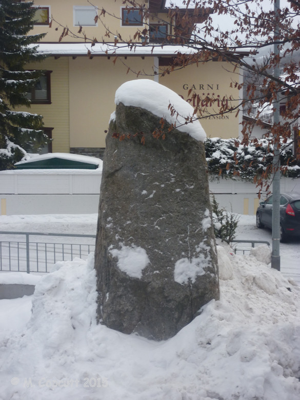 Within central Sölden, there is a large stone of 3 to 4 metres height just standing there.

I have no idea as to whether this is an ancient menhir, but what else would it be doing here? 