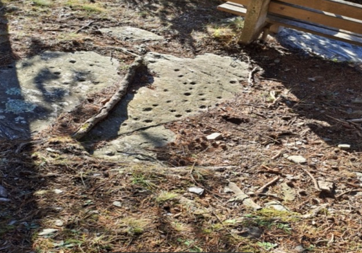 The stone prior to excavation. 