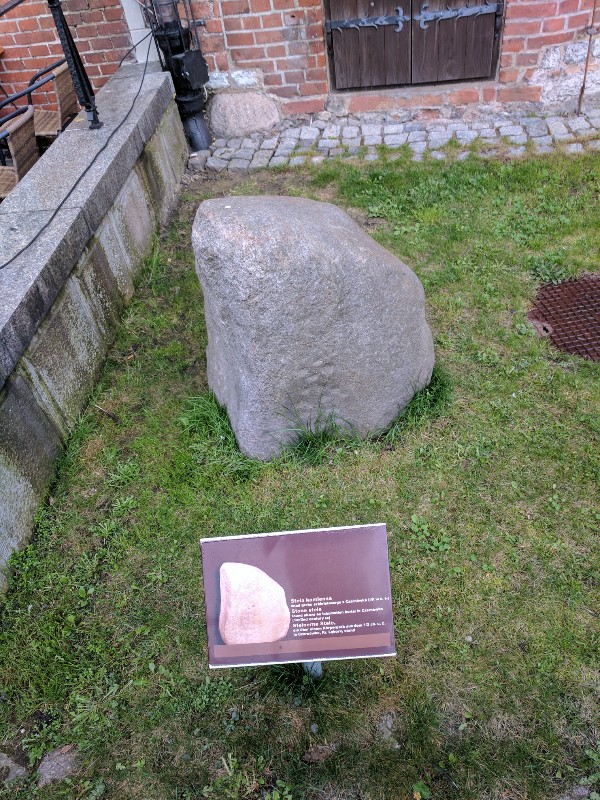 Gdansk Site in Kujawsko-pomorskie Poland. Stone stele with cup motifs, found marking an inhumation burial at what is now Czarnowka, near Warsaw, Poland. The stele is dated to the first to second century AD and now forms part of a collection of five stones on the harbourside at Dlugie Pobrzeze, Gdansk, outside the archaeological museum.