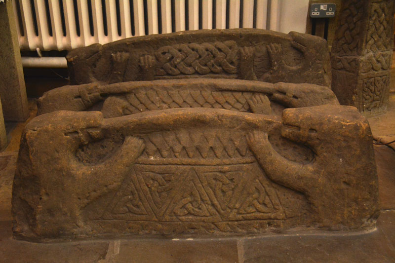 These three hogbacks are truly magnificent. Having been buried in the ground for so long, they look as if they have been carved recently.  Well worth a visit just to see these, never mind the other cross fragments.
