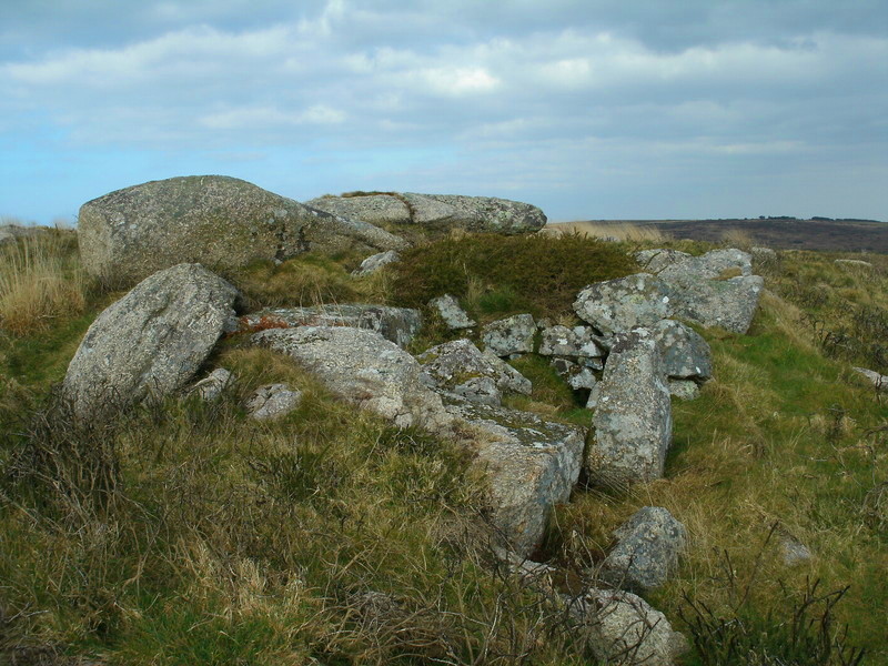 There's what looks like an ancient dwelling built against the natural outcrop near Mulfra quoit, It's at SW453353.