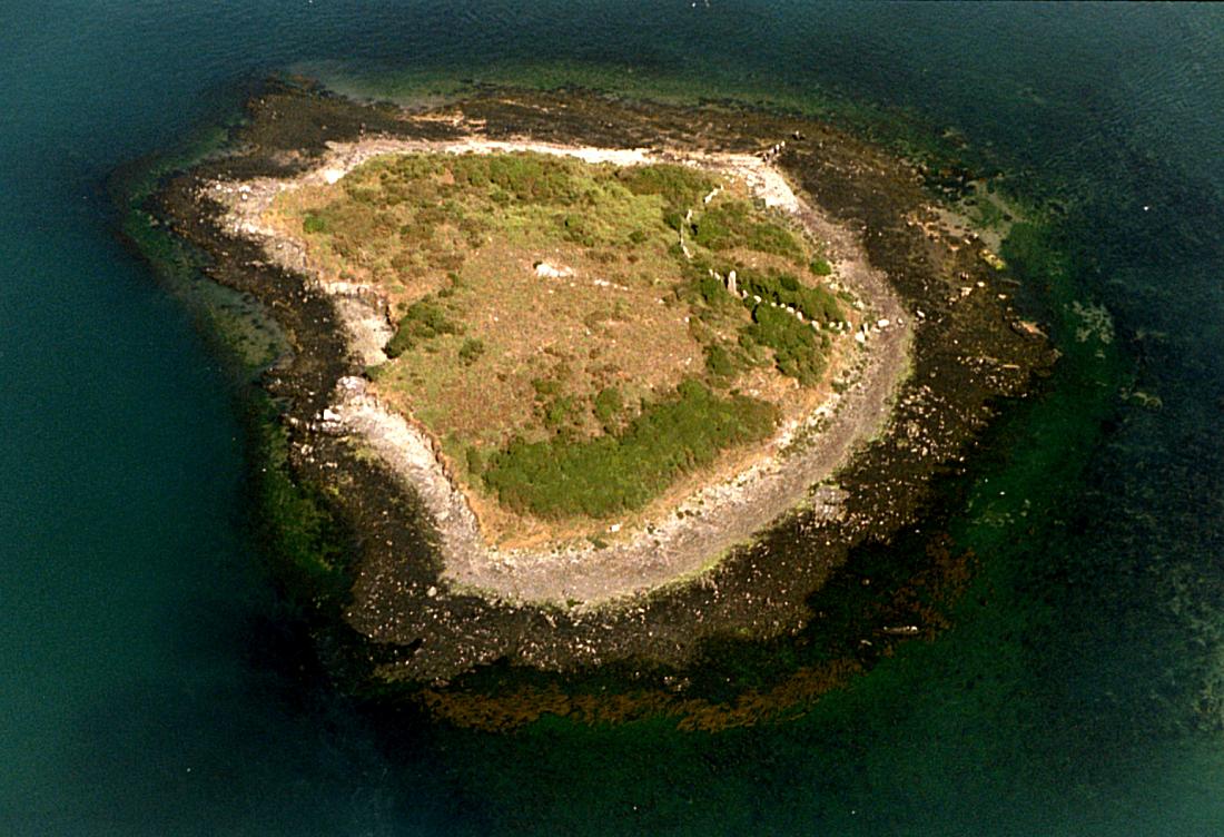 The Island in Brittany, France with the half-submerged stone circle. If you look carefully there is a second stone circle submerged off the coast, making a figure-of-eight pattern with the first. 