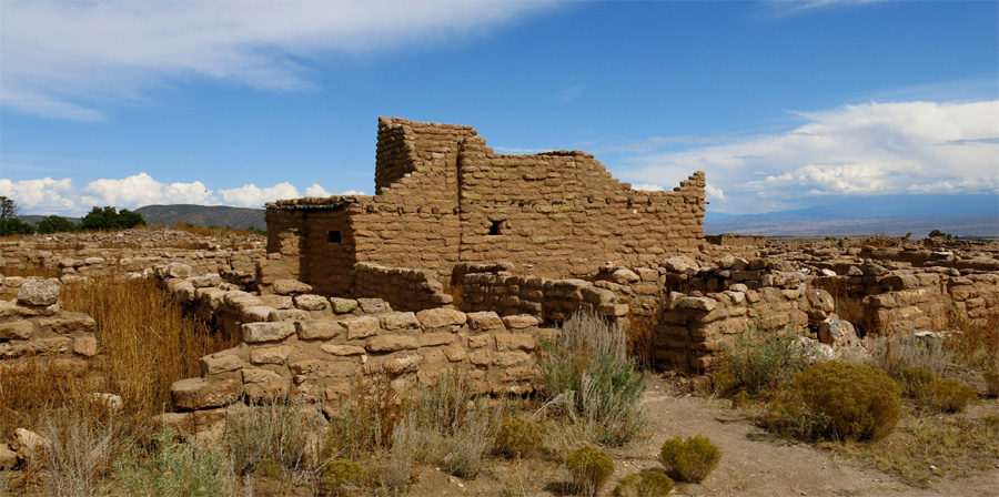 The mesa top multi-storied puebloan village and reconstructed 'Community House' at the Puye Cliff Dwellings.