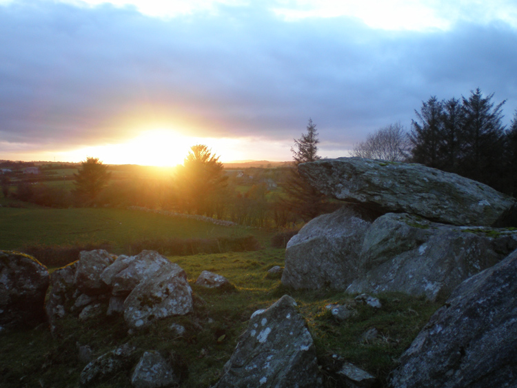 The sun setting behind Dunnamore wedge tomb.