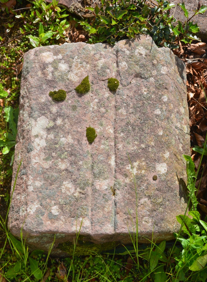 Externally, to the north west of the windmill tower, is a collection of stones and architectural stones, centred around NX 96963 75742.  A closer look at part of a medieval grave marker with an inscribed sword on it.  Included here for completeness. 