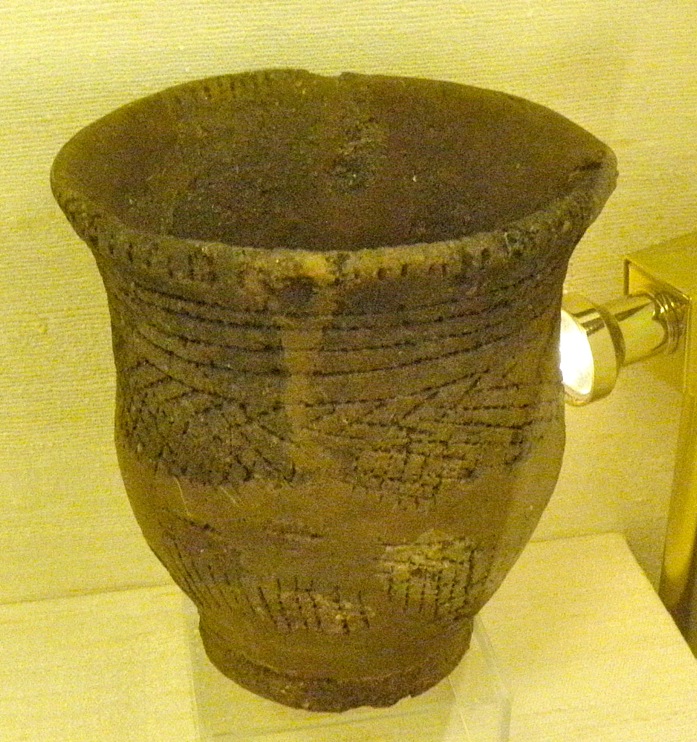 The beaker from a kist found above the Nether Lochaber Hotel, Corran. The kist was excavated in February 1889 and when the beaker was removed it was instantly plunged into water as the excavator believed it would disintegrate when it came in contact with the air. Inevitably the beaker fell a part in the water and it had to be repaired with plaster of paris.
