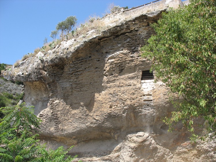 Opening of Domus de Janas della rocca seen from the south (photo taken on August 2011).