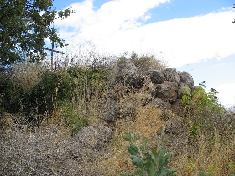 Remains of Nuraghe Sa Corte - view from the West. This is the closest I could get to the ruins (photo taken on September 2009). 
