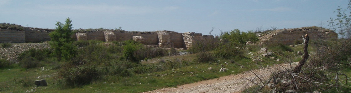 Asseria HillfortIron Age Hillfort near Zadar Croatia. Later taken over by Romans, but abandoned in 6th Century during Slav invasions.The fortifications were made of large limestone blocks by native Liburnian Illyrian natives already inspired by Greeks.You have to drive through partially war devastated villages to get there, but roads are pretty good.