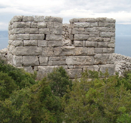 Tor Hillfort

Iron Age Hillfort above the village of Jelse on Hvar Island as seen from the south.
The indentation probably served for entry via a ladder.
Built by native Dalmatian Illyrians with some Greek influence.