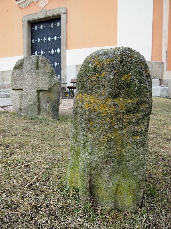 Cross on the left stood at a crossroads where, according to legend, shepherd was killed by an enraged bull.