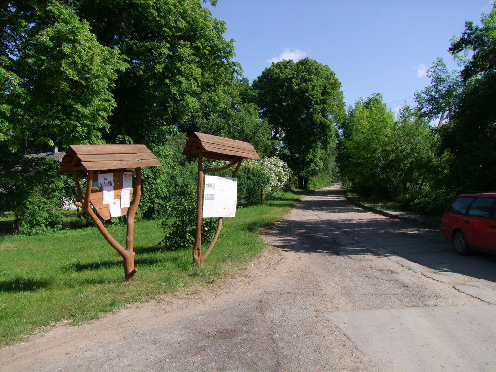An information board at the end of Švendubrė, at (53.98035, 23.93693).  From here, follow and trust your navigator.  If you are scared by potholes, better go on foot, as the road becomes a field road before reaching the 