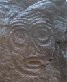 Petroglyph in Sakatschi Aljan (also called Sikachi-Alyan) in Siberia, Russia.<br />
<br />
This photo was taken of a basalt stone replica shown in the Museum of Natural History Nürnberg (Bavaria, Germany). <br />
<br />
The petroglyph is thought to show a mask of a shaman. The original is supposed to have been created in the Neolithic about 5000 - 6000 years ago.<br />
<br />
The copy was made from the original stone by Mr Babaev and then brought to Germany in 2002.<br />
<br />
© Platta 2015