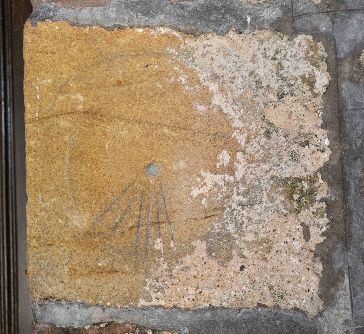 Sundial now incorporated into the eastern jamb of the door into the church (southern side - inside porch). The notice on the noticeboard inside the porch tells us: 