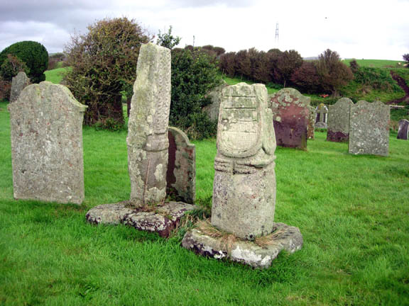 The squat Saxon cross at Beckermet is stylistically very similar to Eliseg's pillar at Llangollen and to others in the Lyme, the moorlands fringing the eastern border of Cheshire and Staffordshire with the Peak District, especially between Macclesfield and Leek. The western side of the Beckermet cross, shown here, displays a panel thought to carry Viking runes carved on its surface.