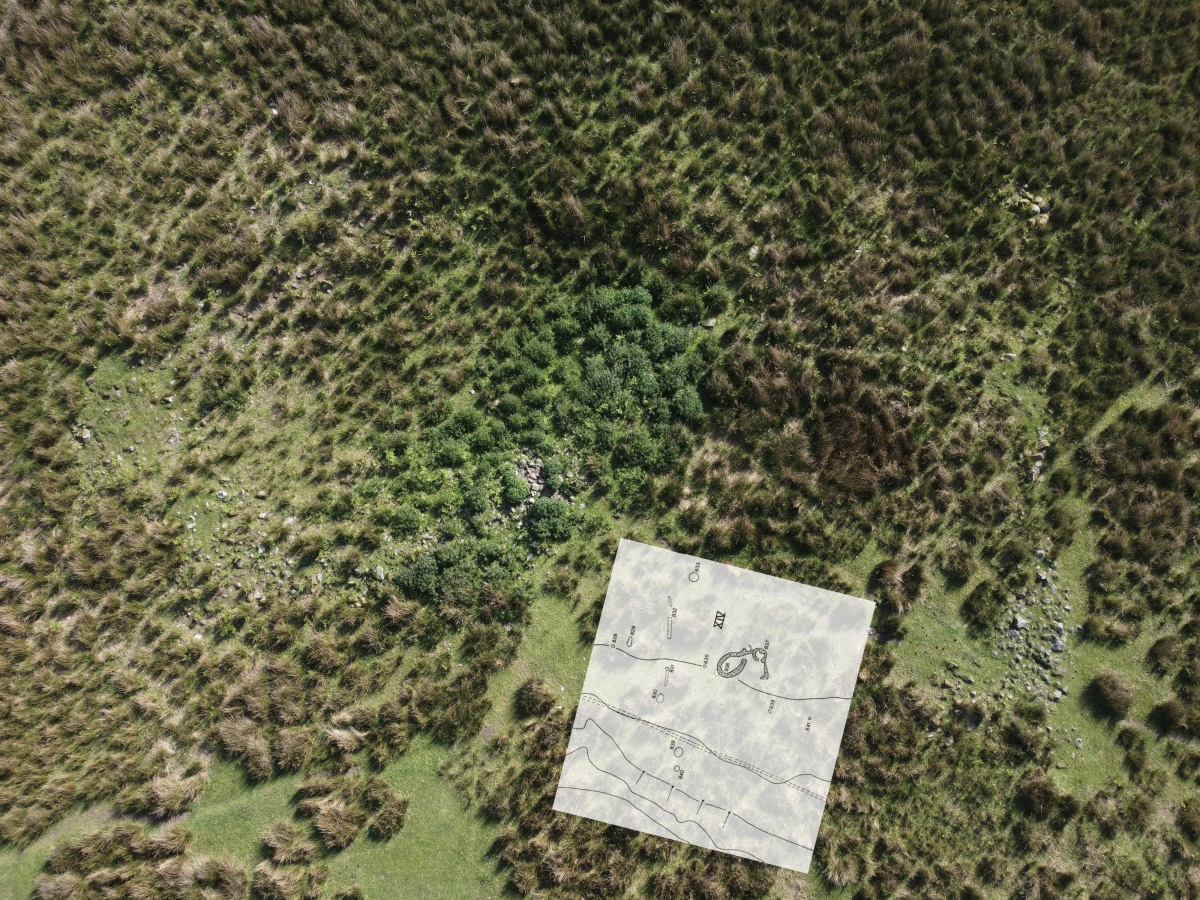 Another roundhouse and adjoined enclosure, associated with Tongue How. 
Located on the western slope it is quite hard to find, and hard to get a decent photograph. The enclosure is sunken in the centre and the walls are of a good width, neither of which show up in the picture, but are quite obvious on the ground.