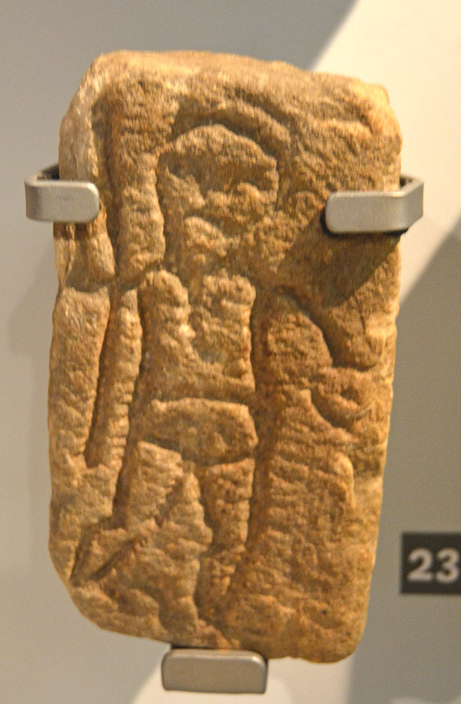 [This photo is a little blurred, due to the low lighting and no tripod - I'll go back and retake it shortly.] This scratched-on figure of a horned god was found at Vindolanda Fort and is said to have been associated with fertility in pre-Roman Europe.  