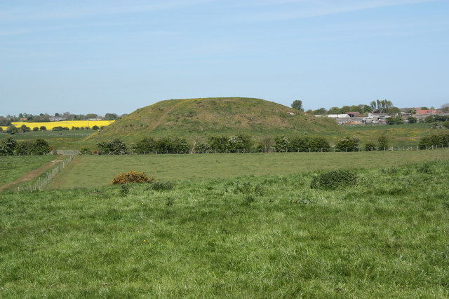 Skipsea mound from one of the castle earthworks

Copyright Richard Croft and licensed for reuse under this Creative Commons Licence.