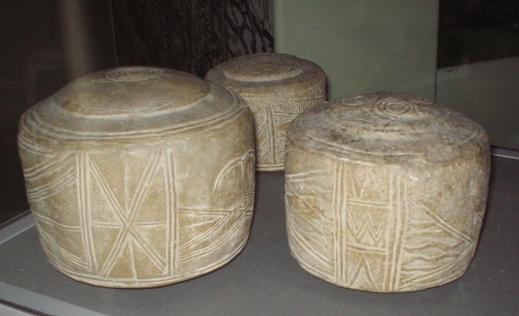 Replica of the Folkton Drums, the originals are in the British Museum. See my visit log for links. The designs on these are outstanding, they were buried with a young child. No-one has a clue as to their function.
