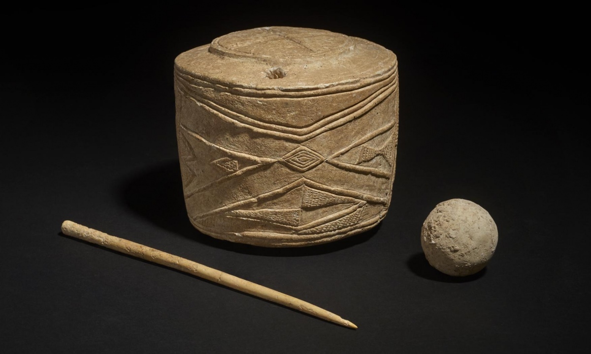 The chalk drum, chalk ball and bone pin discovered in Burton Agnes, East Yorkshire in 2015. Dated approximately 3005-2890BC. 

Ancient sculpture is ‘most important prehistoric art find in UK for a century’

The 5,000-year-old chalk drum decorated with motifs was discovered in Yorkshire alongside burial of three children

Photo Credit: British Museum