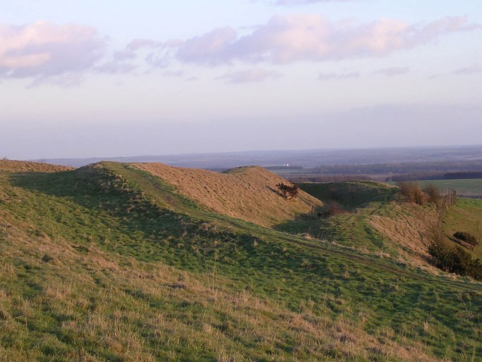 February 2005. Looking at the south-western ditch and rampart on Beacon Hill from the corner occupied by Lord Carnarvon's grave. The earthworks enclose about 12 acres and give the camp an 'hourglass' shape, with the entrance on the southern corner.