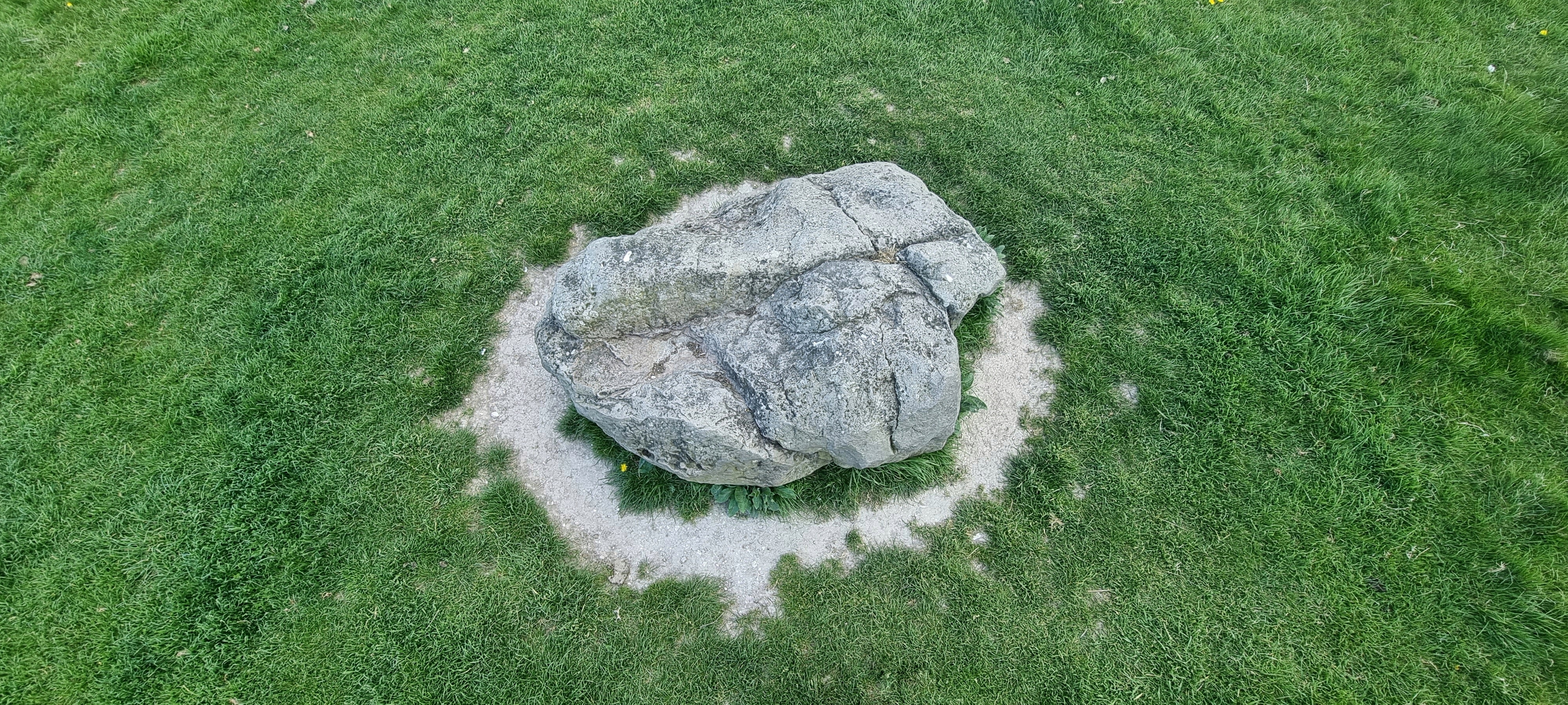 Looking down on the stone but if in its original situ, then actually looking at one of its faces.