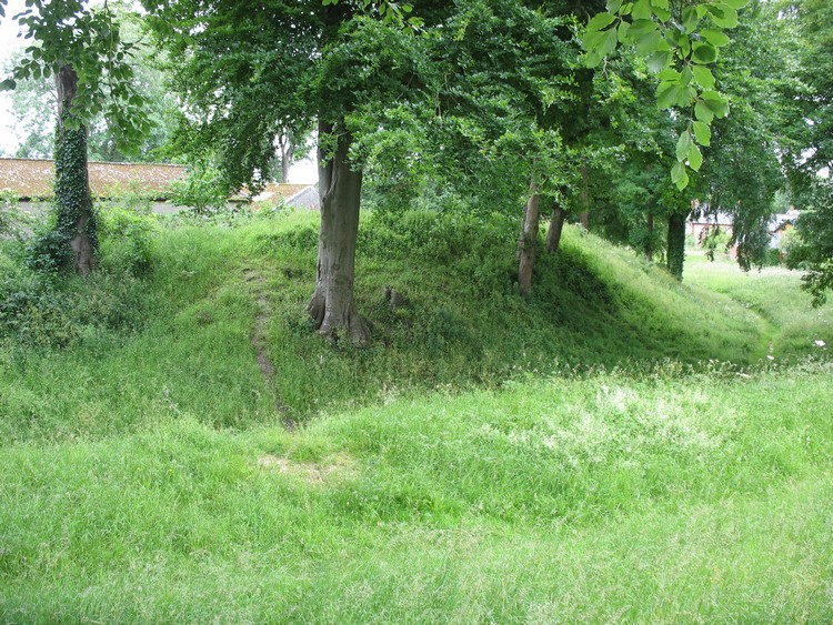 Rampart and ditch in western part of southern enclosure - view from the NW (photo taken on June 2012).