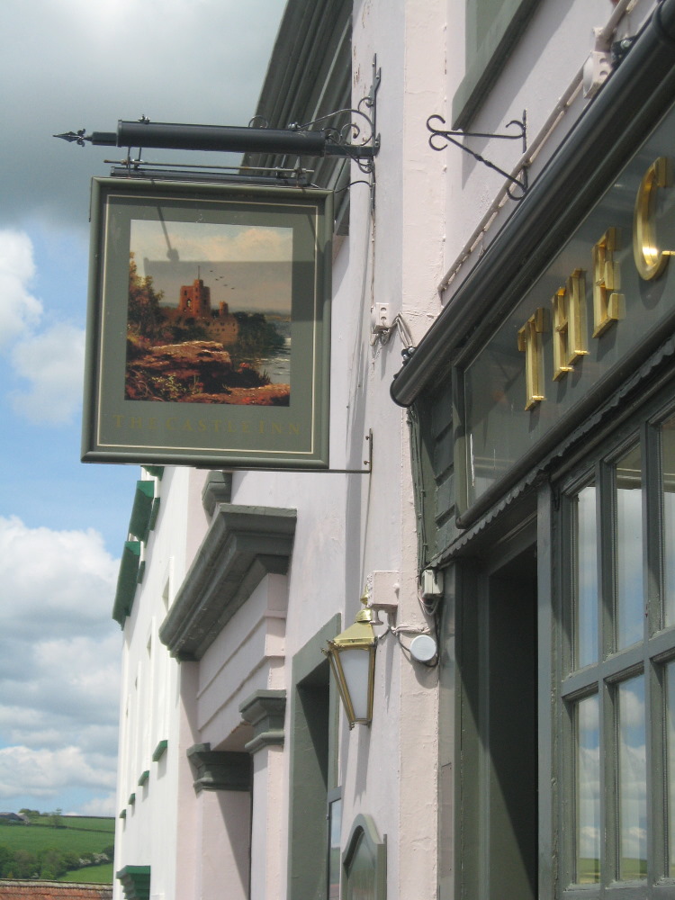 This is the Castle pub with its board showing an artist's impression of the castle, but I've not done any research on this.  The photos of the church follow.