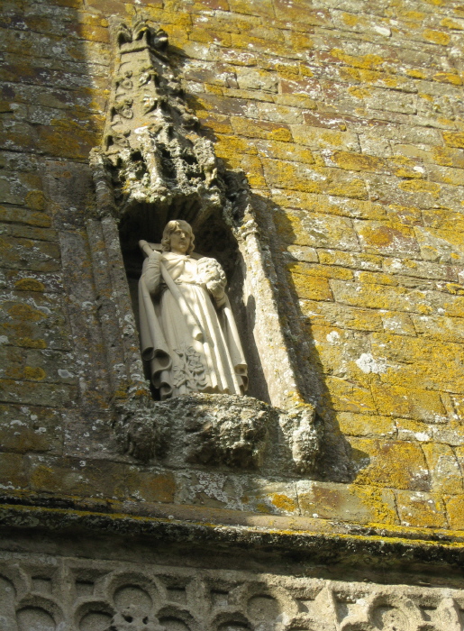St. Hieritha (or Urith) was supposed to have been beheaded in this village and where her blood fell, the spring gushed forth!  Her image, complete with head and sickle [!], is kept it tip top order in a niche on the south side of the west tower of the church.
This was a place of pilgrimage for many years and it's plain to see how the money may have kept this church in such good condition as it is