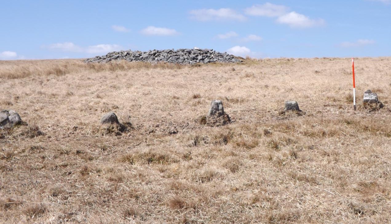 The cairn is adjacent to the Upper Erme stone row. Despite proximity they are unlikely to have been built at the same time. The row is likely to be earlier.