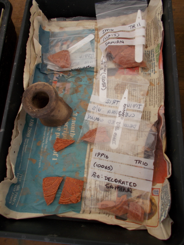More pieces of decorated Samian Ware and a spout of some pot (which I didn't enquire about).