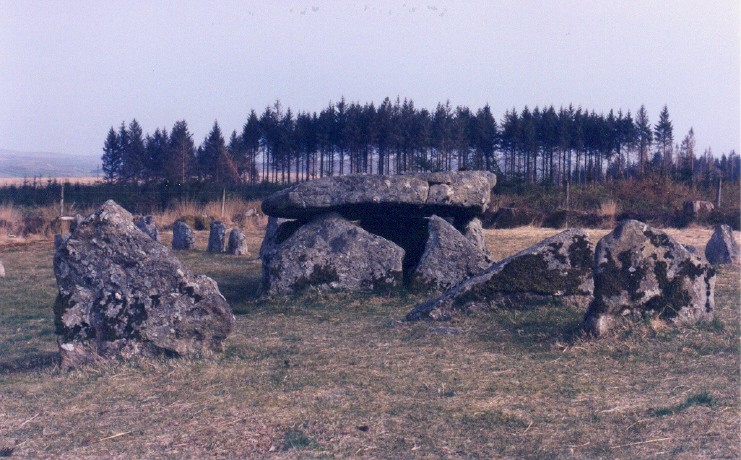 Because the two nearest stones were like portals I crouched down to take this shot, trying to see the horizon behind the trees.  I made a note of the bearing as '120 degs',
where there could be a dip in the distant hills.