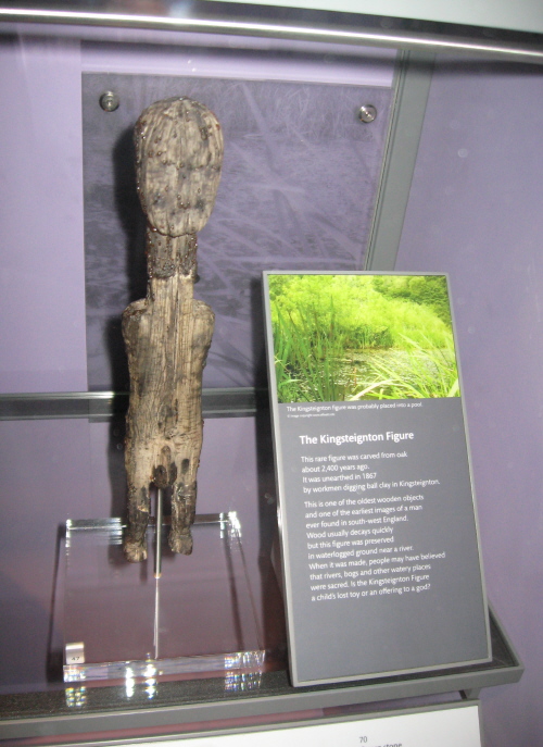 Now re-christened 'The Kingsteignton Figure', the wooden Zitherixon Idol has a new home.  [See Newton Abbot Museum site page for one of its temporary 'holiday homes' while RAMM was closed for refurbishment.]