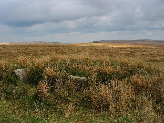 The cairn on Green Hill - Dartmoor
This place is just about the centre point of the south Dartmoor wilderness. It's exposed, isolated and takes a few hours to walk to. The black shape in the distance is the spoil tip of Red Lake. This cairn is the end of the longest stone row in Europe.

Copyright Richard Knights and licensed for reuse under this Creative Commons Licence.