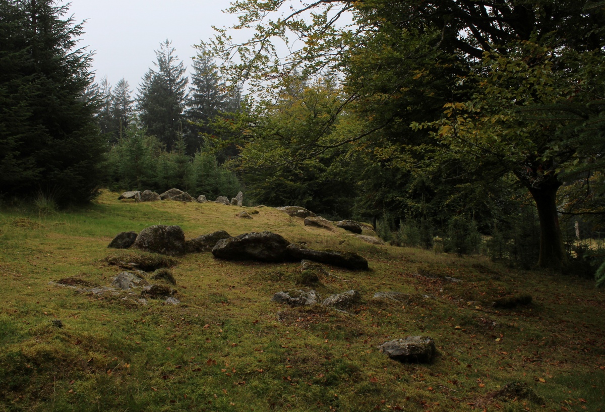 Looking over the third hut circle to number four. One of these four hut circles was once supposed to be cairn circle, I couldn't tell which one, perhaps one of these two.
