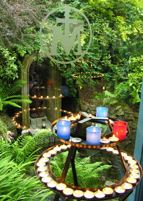 Viewing the well from inside the adjacent chapel. Wonderfully peaceful, and a very content, sleeping cat upon a chair too.