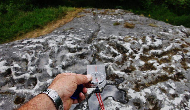 I slowly filled the cup marks highest on the bedrock and watched one flow into another before continuing south down a channel in the rock.