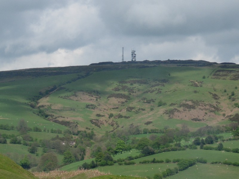 Looking at the summit of Brown Clee Hill - home to the remains of Abdon Burf hillfort; this is nearly completely destroyed from quarrying. Records suggest a recumbent stone some 8ft long still surviving.