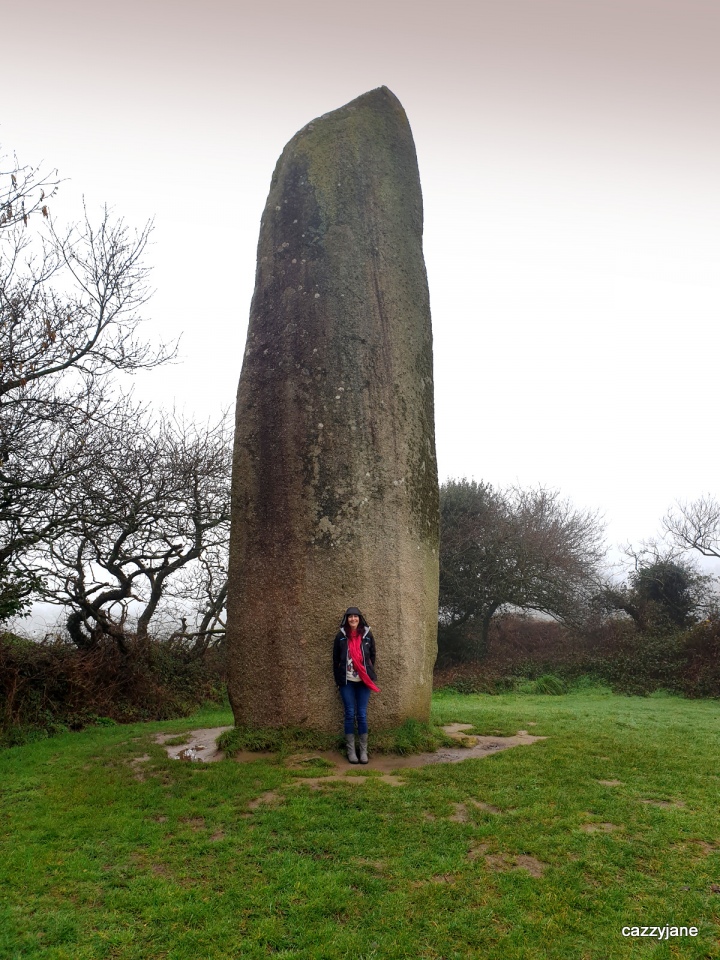 Kerloas Menhir Kerloas Menhir. Possibly the tallest menhir in the world. I don't like to be included in the photo's but this is the only way to show how massive this stone is!