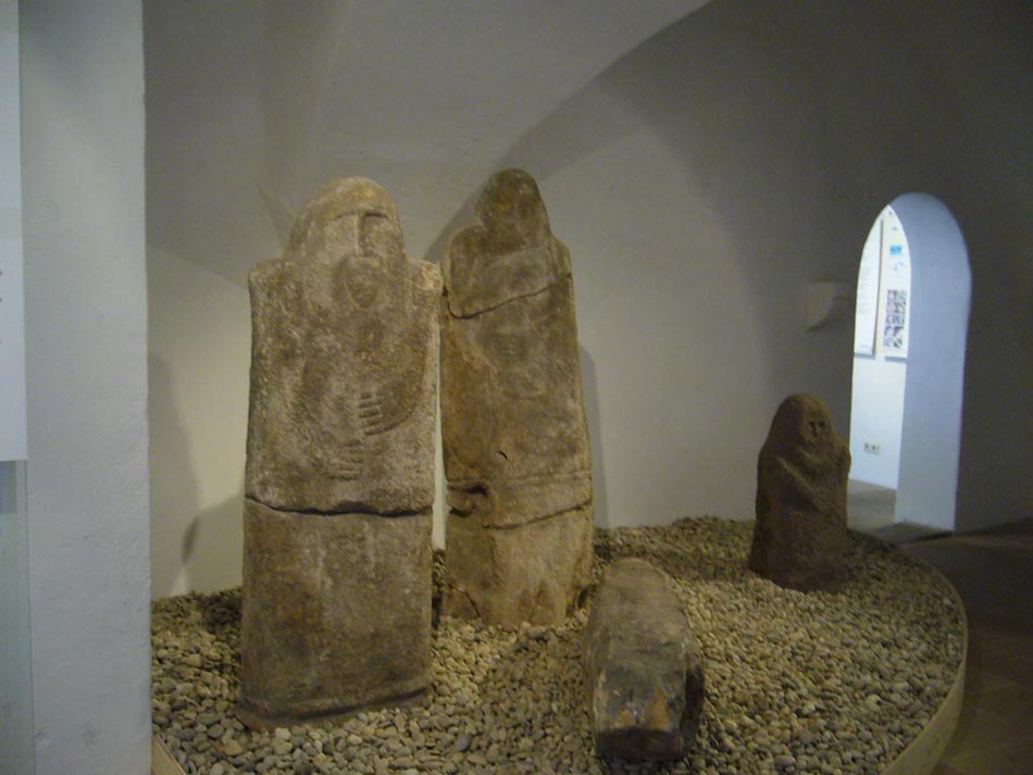 3 probable Iron Age statue menhirs found in 1857 at an undisclosed location and taken to the Bamberg Historical Museum.  Together with Ebracher Goetzenstein at the right.
