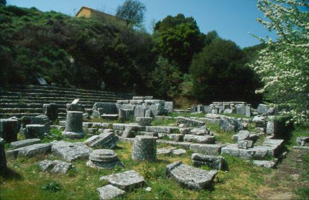 Site in Peloponnese Peninsula Greece:Lycosoura. In front is the end of the stoa, follows the podium of the cult statues and in the background the Temple of Despoina. At the right side are the stone seats of the theatre.