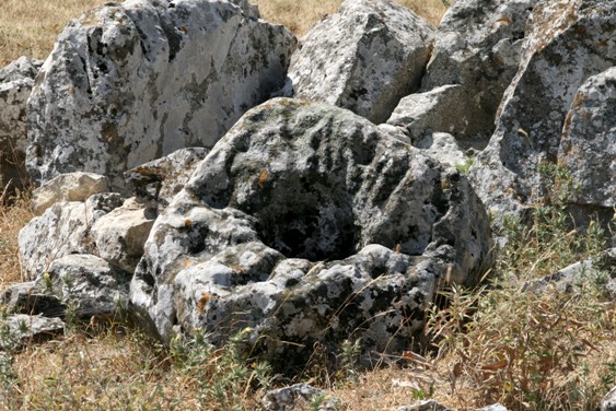 Compass Stone at the Mountain Besh Barmak.
This multi channeled stone is extremely intricate and has many similar features to oriented rock art that I have come across elsewhere in Azerbaijan. 
( Ref http://azer.com/aiweb/categories/magazine/ai143_folder/143_articles/143_mt_index.html).  
Because of its location, due west of an imposing rock crag called Besh Barmak, or Five fingered mountain wh