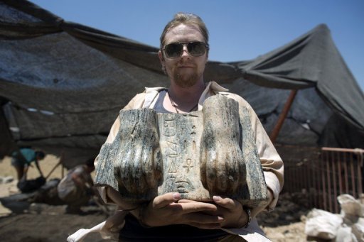 An Australian excavation volunteer on July 9, 2013, displays part of an ancient Egyptian king's unique sphinx with a hieroglyphic inscription dating circa 3rd century BCE, found during excavation at the northern Israeli site of ancient Tel Hazor. The sphinx was unveiled with researchers struggling to understand just how the unexpected find ended up there. 

Image credit: Hebrew University

