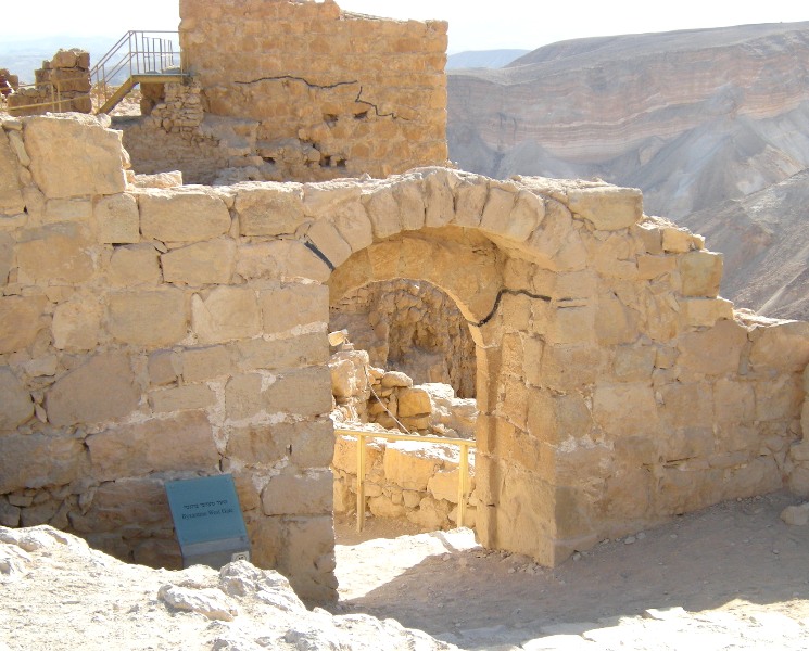 Masada

The western Byzantine gate : This gate of dressed stones stood at the
upper end of the path that led over the ramp to the top of the mountain
during the Byzantine era. It serves as an entrance to this day.
To visit the water cisterns you can leave via the Byzantine gate, take the ramp
path west for about 75 meters, and near its starting point turn right on the
signposted trail. The 