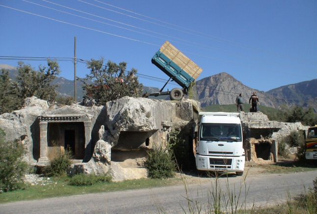Ancient tombs used by the locals for loading animal fodder onto a lorry.