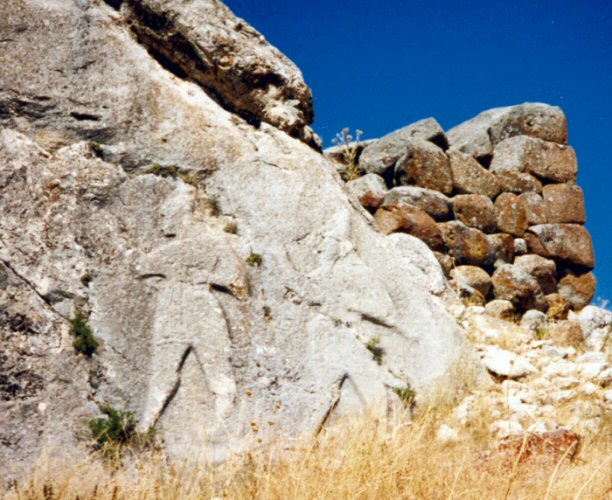 A relief of two gods walking.August 1993.