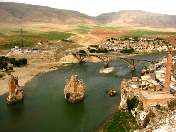 A view of the ancient bridge across the Tigris as the river flows through Hasankeyf. 

(Courtesy Senol Demir/Flickr Creative Commons)
