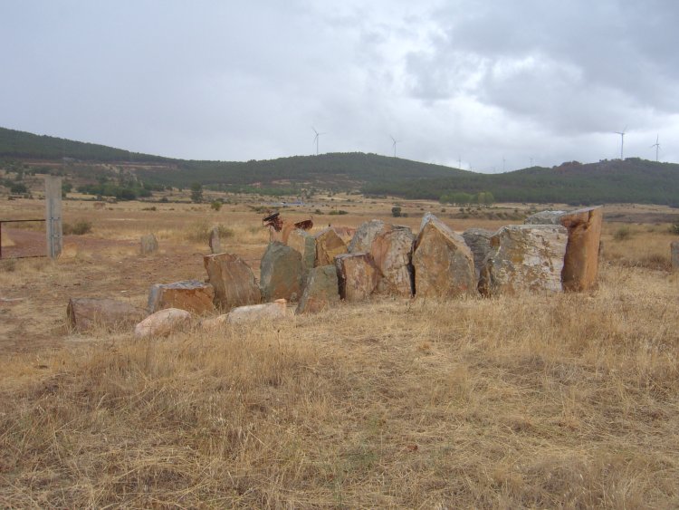 The beautiful and wild Carpurias Hills frame the eastern view of the Caseton de los Moros Passage Grave.