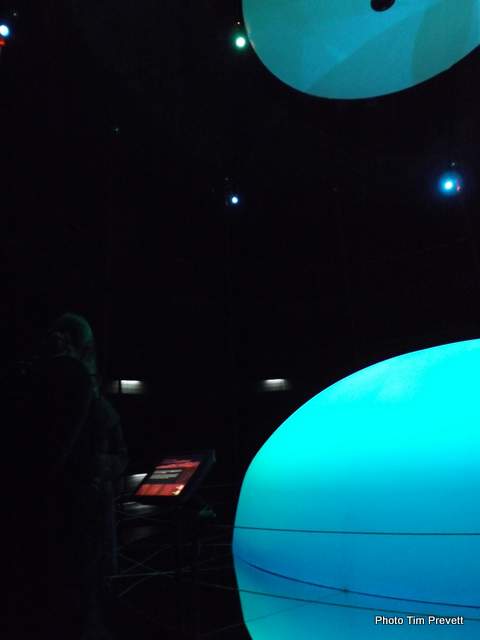 The centrepiece of the centre is a huge half sphere, reflected in mirrors so it appears a whole sphere, in the centre of dark room, with a spiral staircase around the room's interior. Images are projected on to this sphere. The juxtaposition of something so sci-fi looking in a small rural community is very striking!